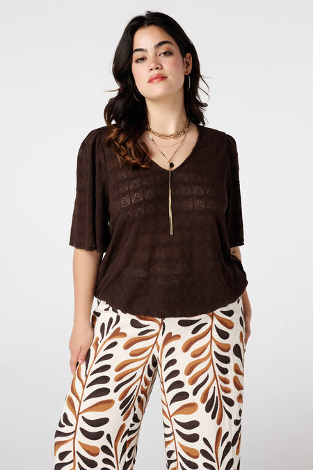 Haut avec motif ajouré Haut avec motif ajouré