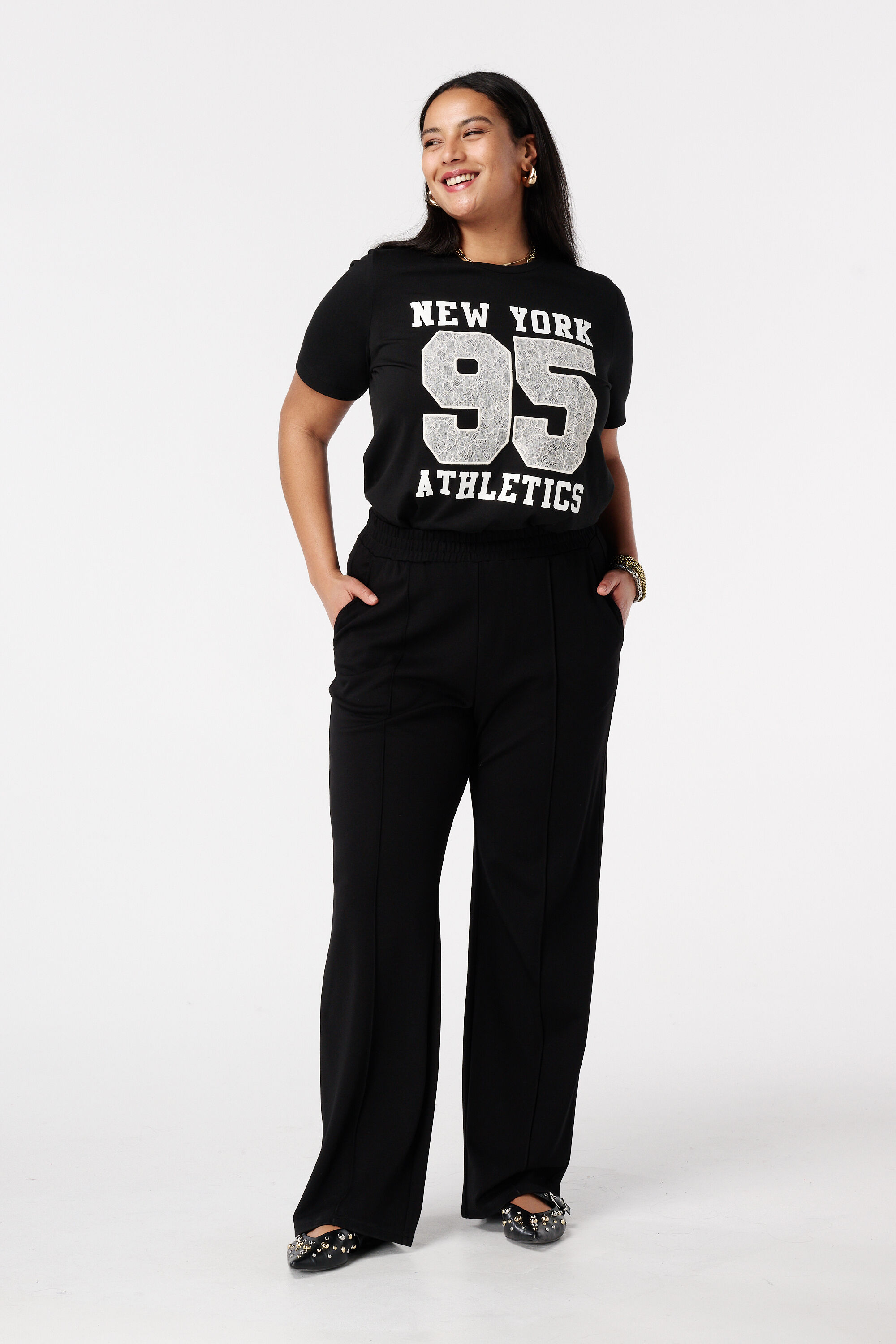 Pantalon large avec coutures d&eacute;coratives