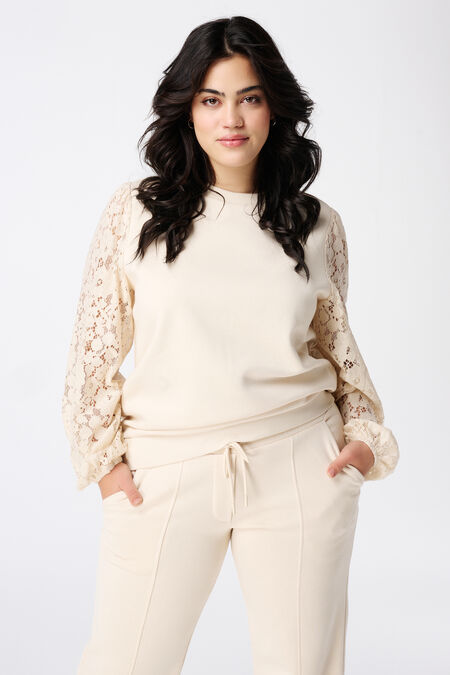 Haut avec manches en dentelle Haut avec manches en dentelle