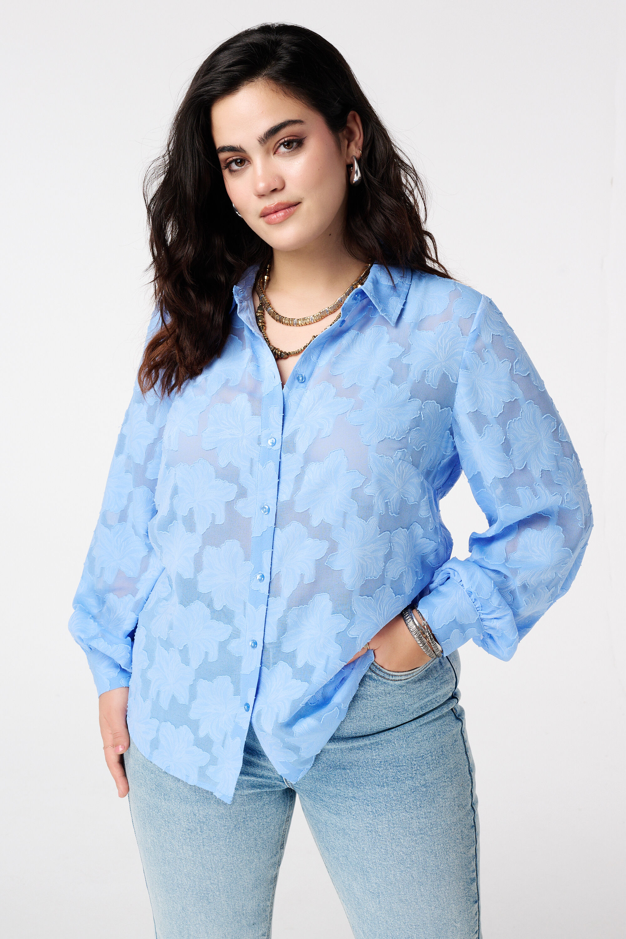 Blouse transparente &agrave; motif floral