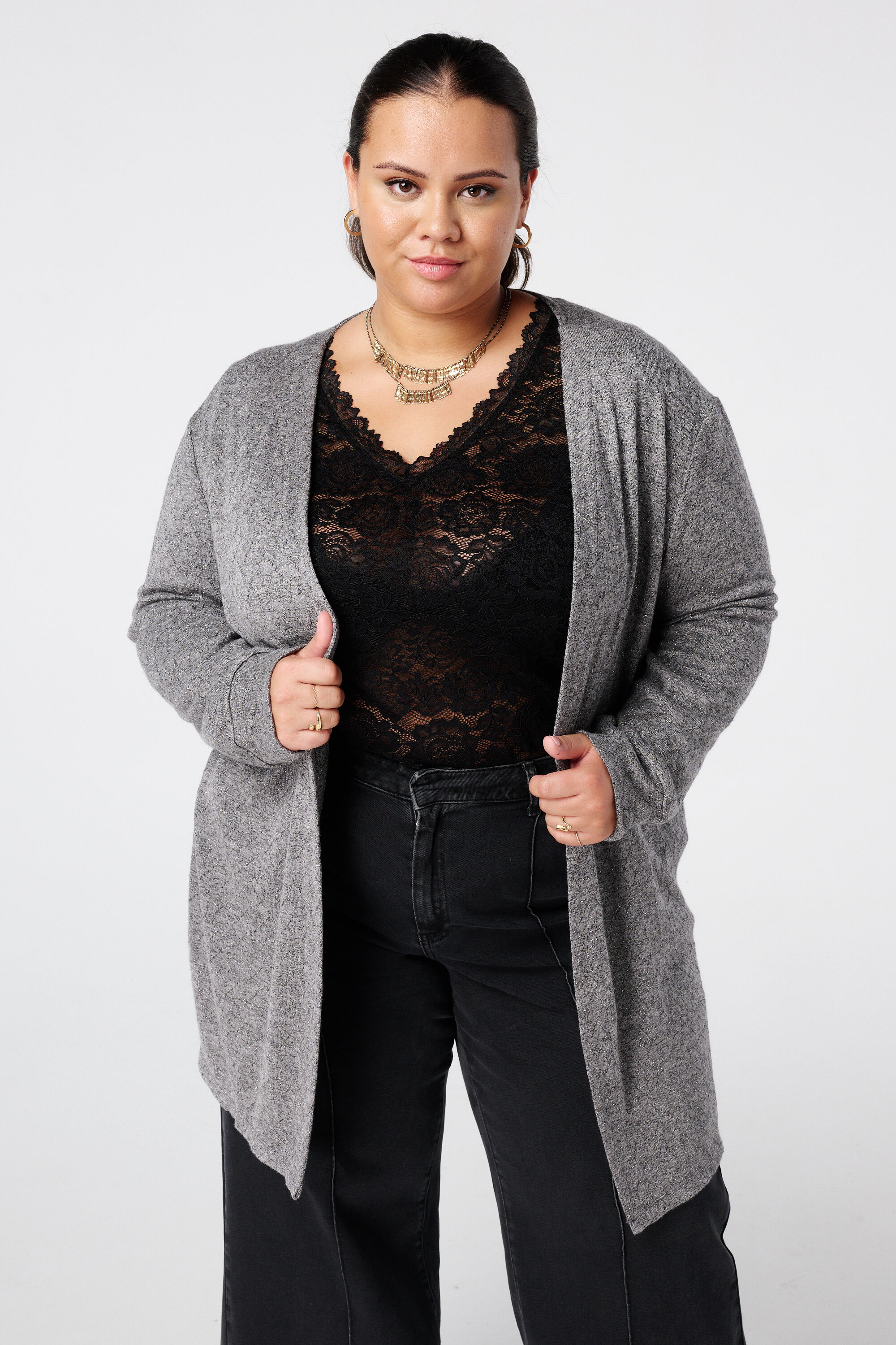 Gilet textur&eacute; et un d&eacute;tail paillet&eacute;